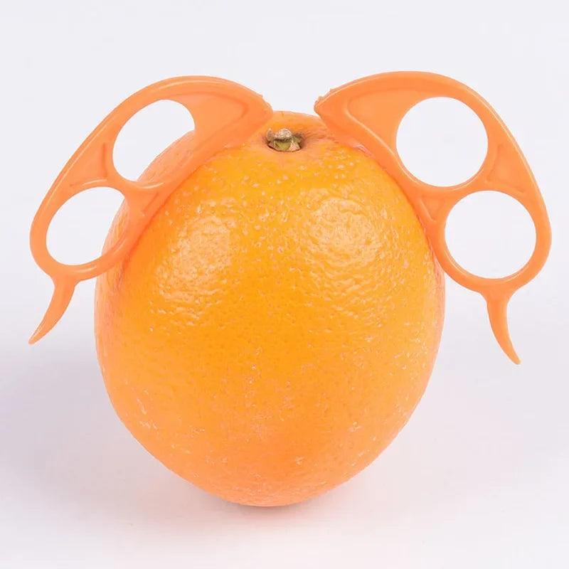 Éplucheur en plastique pour oranges et citrons