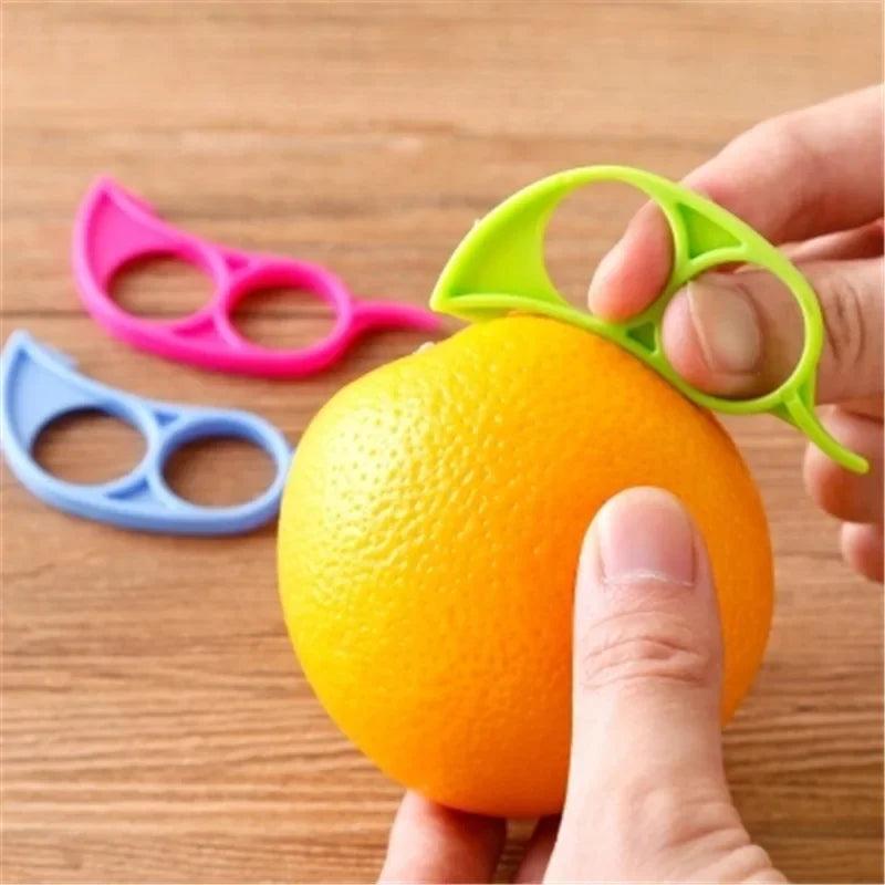 Éplucheur en plastique pour oranges et citrons